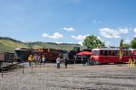 Various pieces of rolling stock surround the turntable at the Colorado Railroad Museum